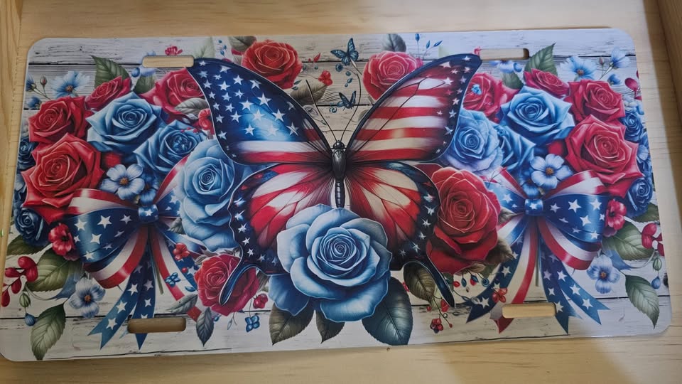 Patriotic butterfly and flowers license plate
