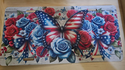 Patriotic butterfly and flowers license plate
